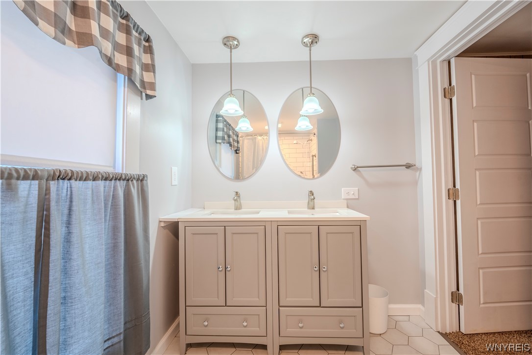 4031 Lewiston Road Niagara Falls, NY 14305 - Photo 28 of 42 Recently updated bathroom with good amount of spac