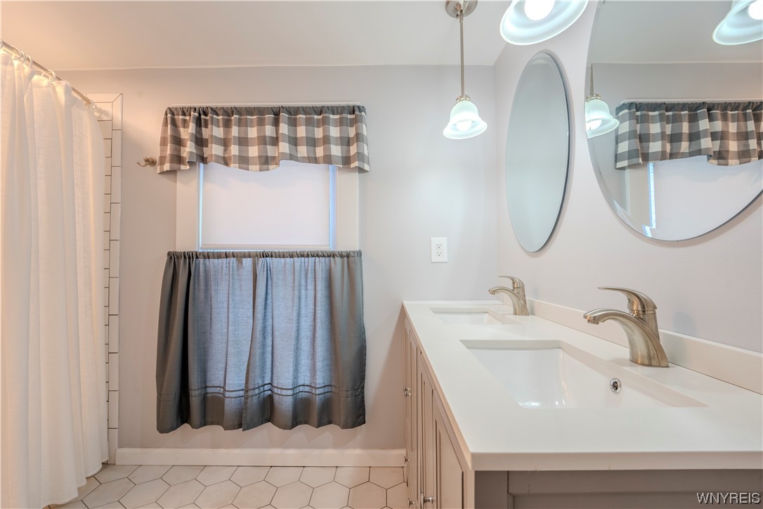 4031 Lewiston Road Niagara Falls, NY 14305 - Photo 30 of 42 Double modern vanity for storage