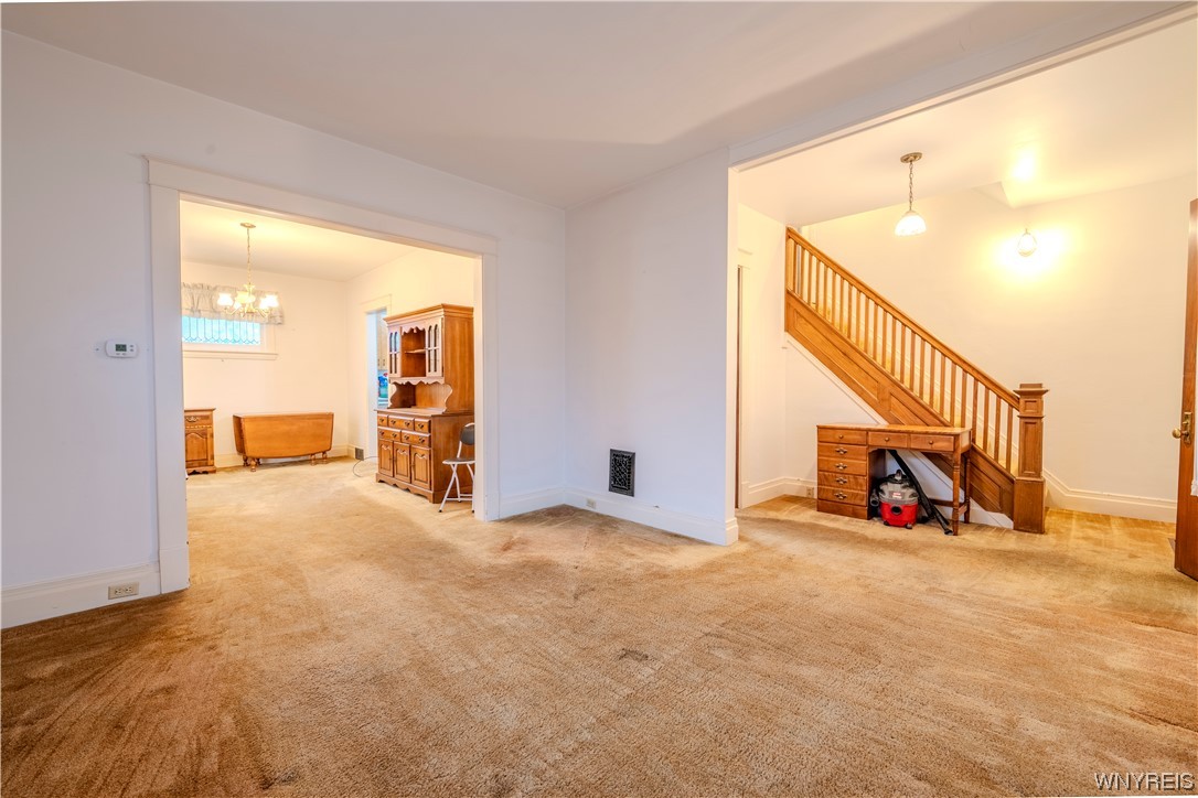 4031 Lewiston Road Niagara Falls, NY 14305 - Photo 8 of 42 Large Livingroom hardwood floors under carpet