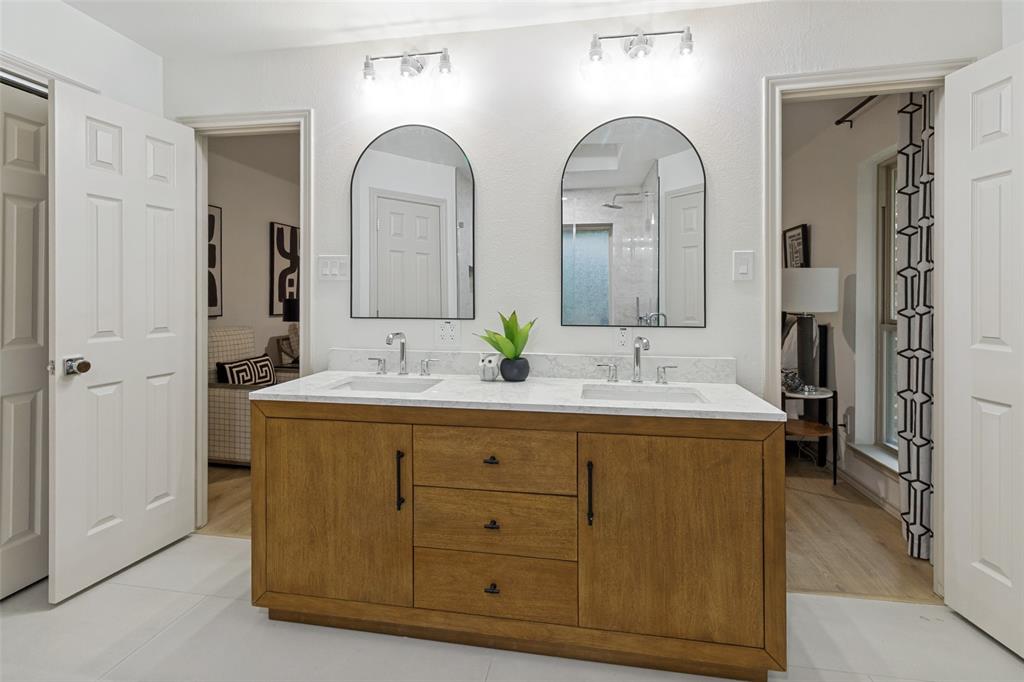 2607 Timberleaf Circle Carrollton, TX 75006 - Photo 13 of 34 Beautiful Primary bathroom with custom showing, his/hers closets