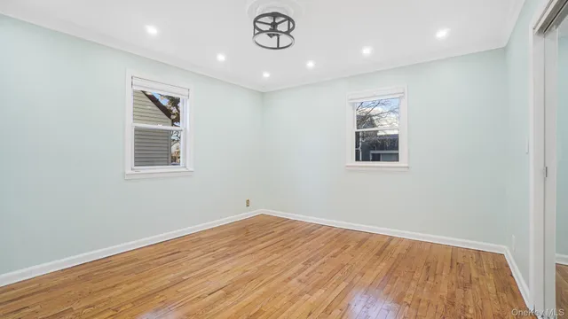 a view of storage and utility room with a window