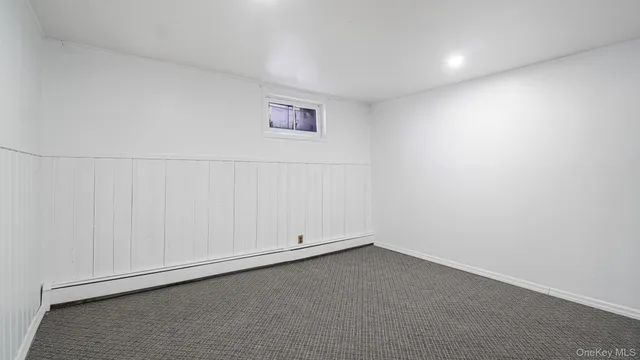 a room with lots of furniture and a wooden floor