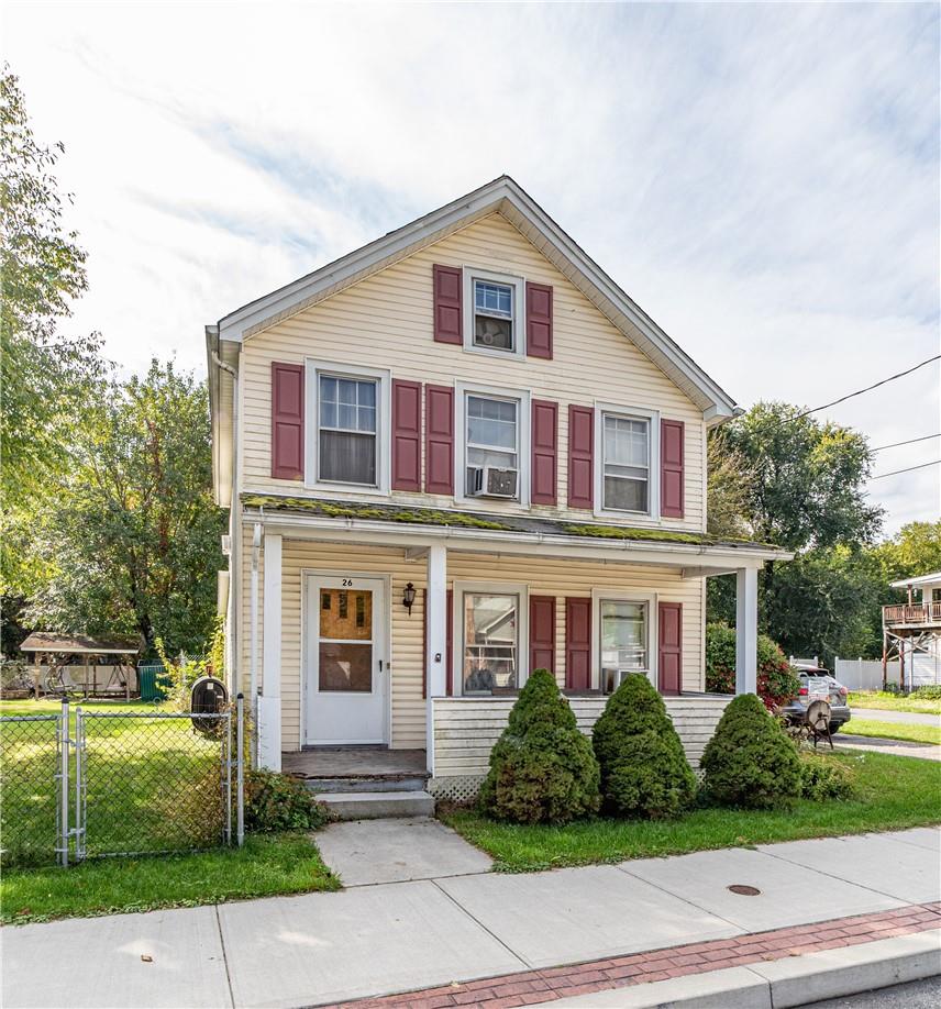 26 Bridge Street Wallkill, NY 12589 - Photo 1 of 1 a front view of a house with a garden