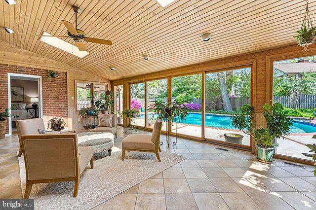 a kitchen with stainless steel appliances granite countertop a refrigerator sink and stove