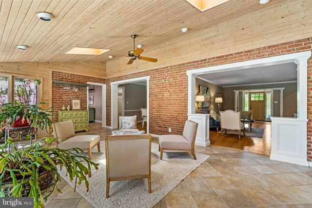 a kitchen with stainless steel appliances granite countertop a stove a refrigerator and a stove