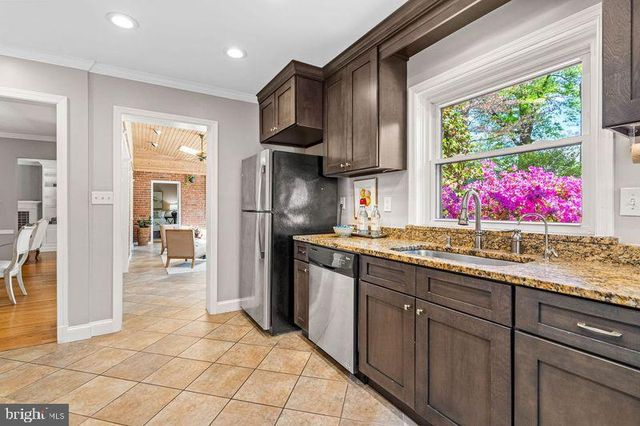 a bedroom with a bed and a table with closet