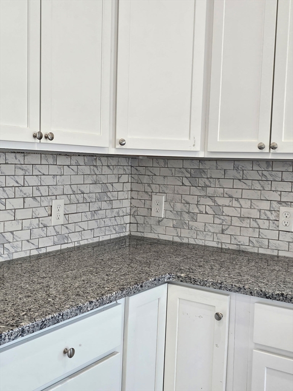 88 Stafford Holland Road Wales, MA 01081 - Photo 4 of 31 a kitchen with granite countertop white cabinets and a counter top
