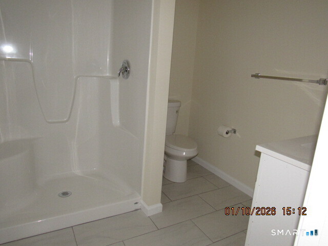 43 Warm Earth Road Naugatuck, CT 06770 - Photo 12 of 24 a bathroom with a shower and a toilet