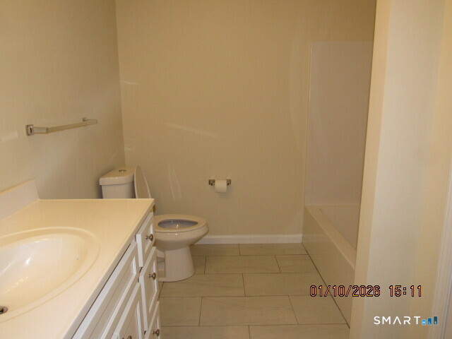43 Warm Earth Road Naugatuck, CT 06770 - Photo 2 of 24 a bathroom with a sink a toilet and a shower