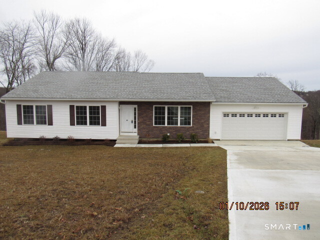 43 Warm Earth Road Naugatuck, CT 06770 - Photo 3 of 24 a view of a house with a swimming pool