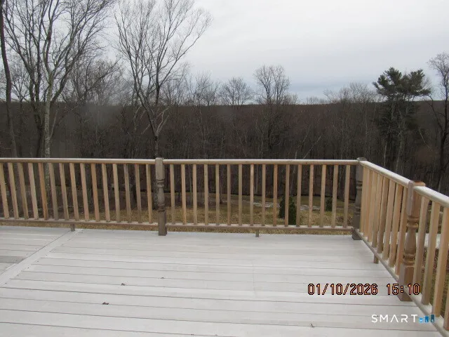 a bathroom with a sink a toilet and a shower