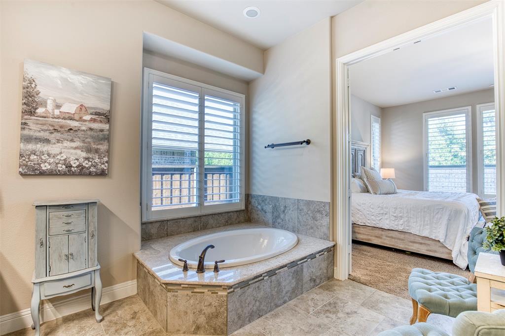 7760 Hackamore Street Frisco, TX 75036 - Photo 19 of 40 Beautiful bathroom with 2 walk-in closets, one leading to the laundry room.