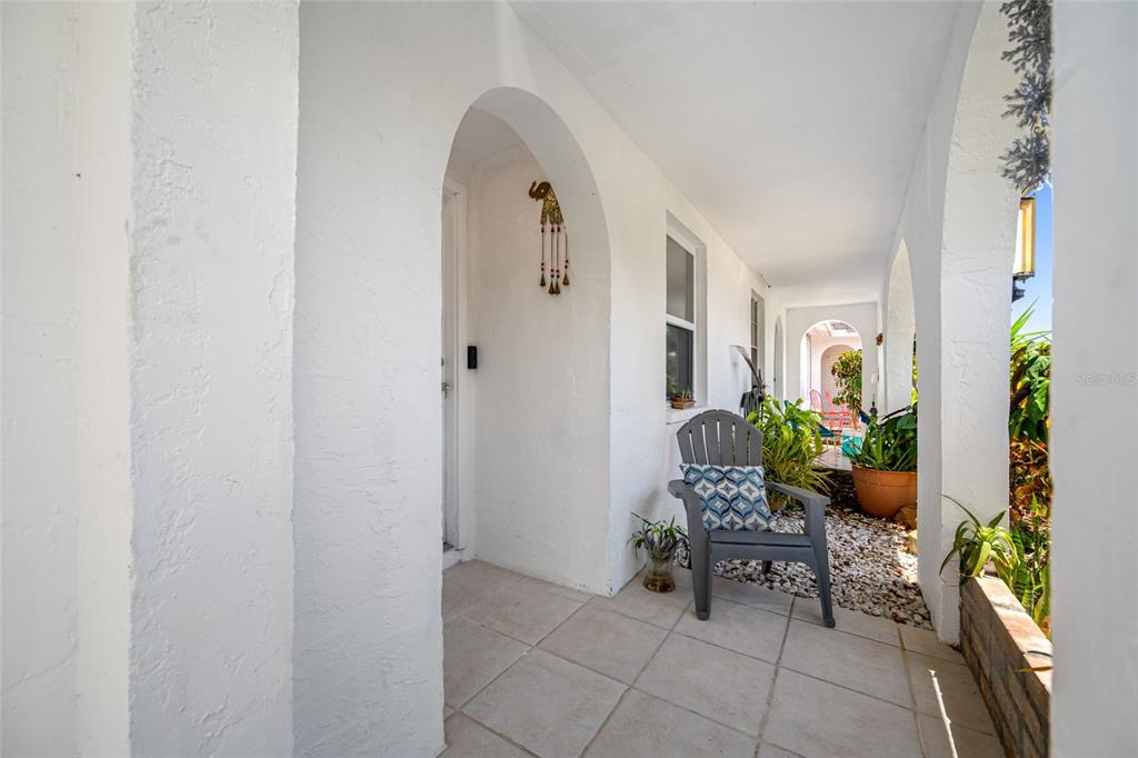 4210 Touchton Place, Unit 2 New Port Richey, FL 34652 - Photo 4 of 34 a living room with furniture