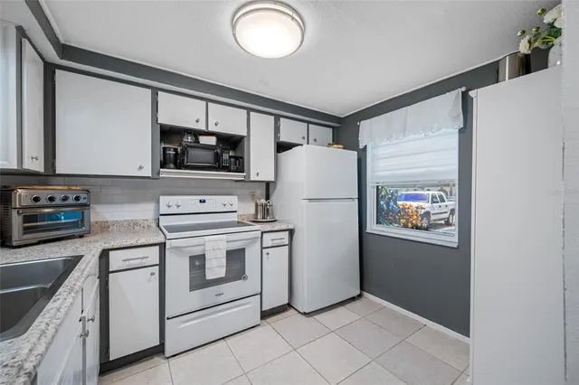 a view of a hallway with front door