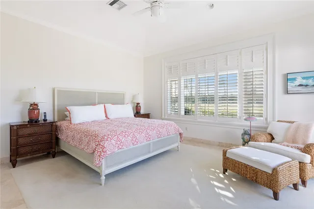 a bed room with a bed and a couch