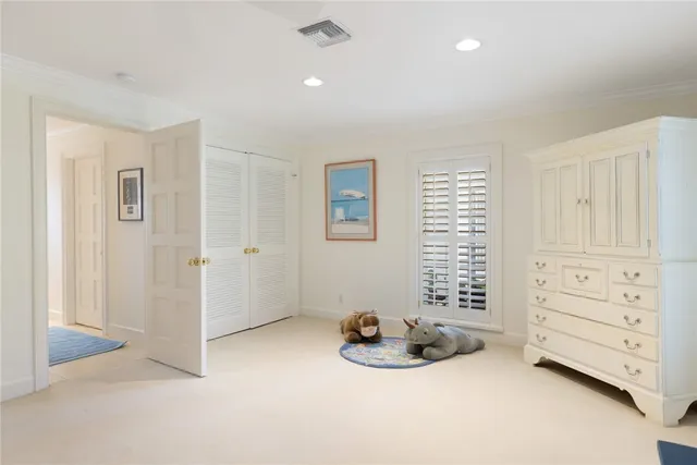 a view of room with cabinet and stairs