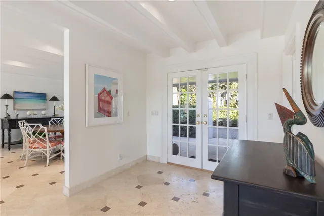 a view of a livingroom with furniture and workspace