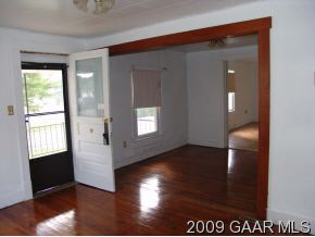 30 Fishersville Road Fishersville, VA 22939 - Photo 4 of 8 a view of empty room with window and wooden floor