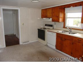30 Fishersville Road Fishersville, VA 22939 - Photo 6 of 8 a kitchen with stainless steel appliances granite countertop a sink stove and refrigerator