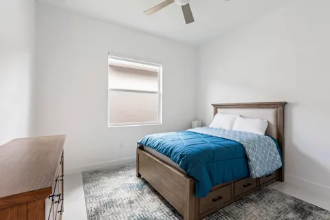 a bathroom with a glass door shower