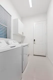 a view of a workspace with furniture