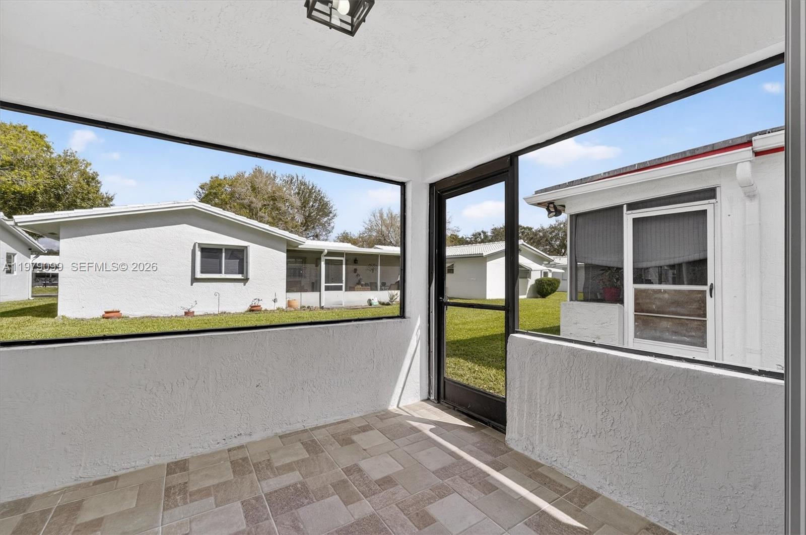 8941 Northwest 13th Street Plantation, FL 33322 - Photo 23 of 26 a view of a building from a balcony