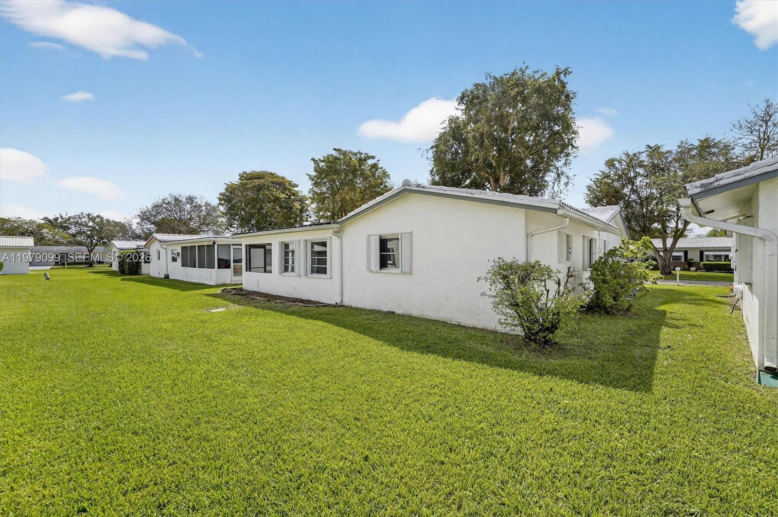 8941 Northwest 13th Street Plantation, FL 33322 - Photo 25 of 26 a house view with a garden space