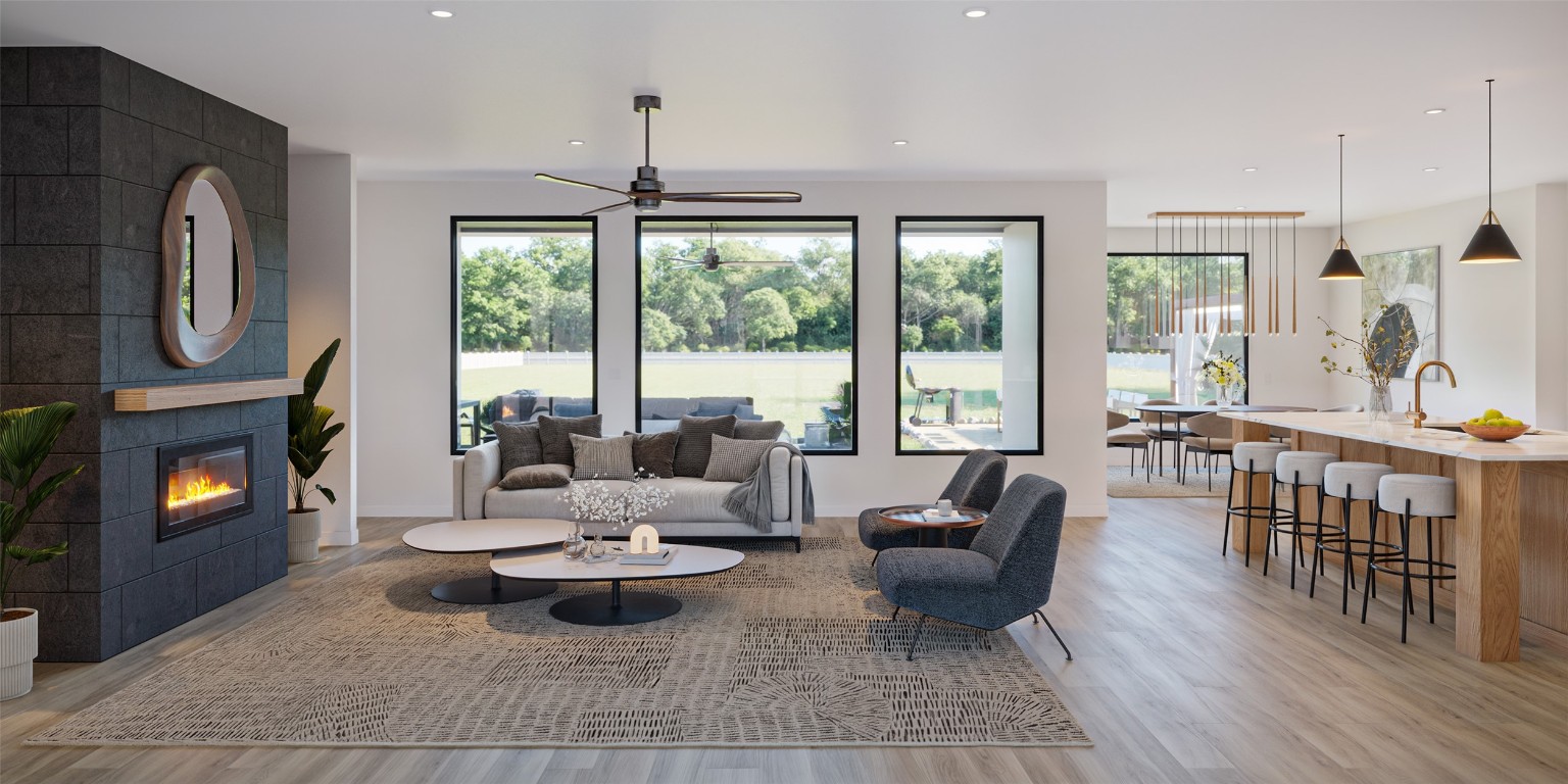 541 Arborland Drive Georgetown, TX 78633 - Photo 2 of 4 a living room with fireplace furniture and a large window