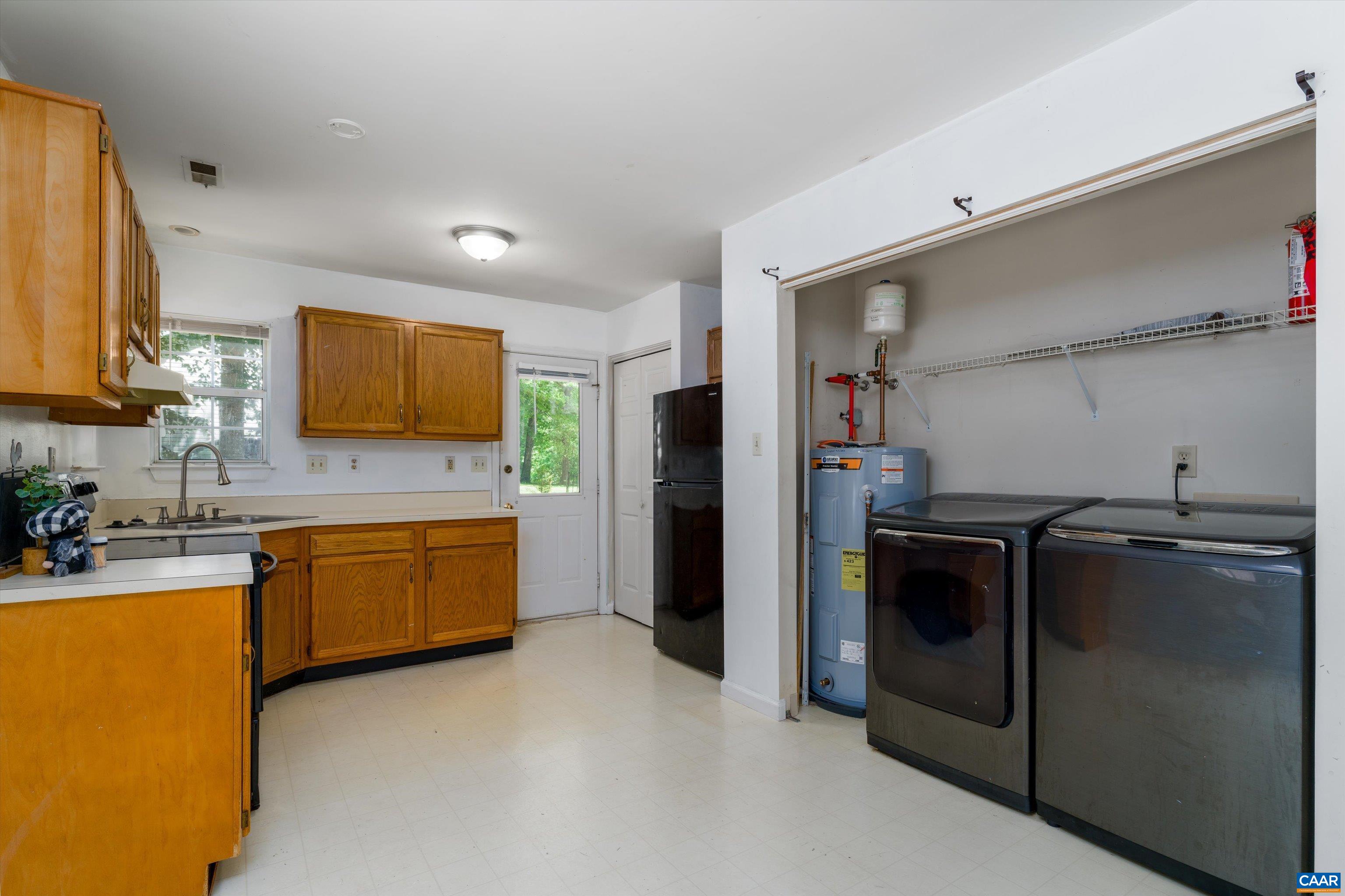 17 Riverside Drive Palmyra, VA 22963 - Photo 15 of 32 a kitchen with stainless steel appliances granite countertop a stove a sink and a refrigerator