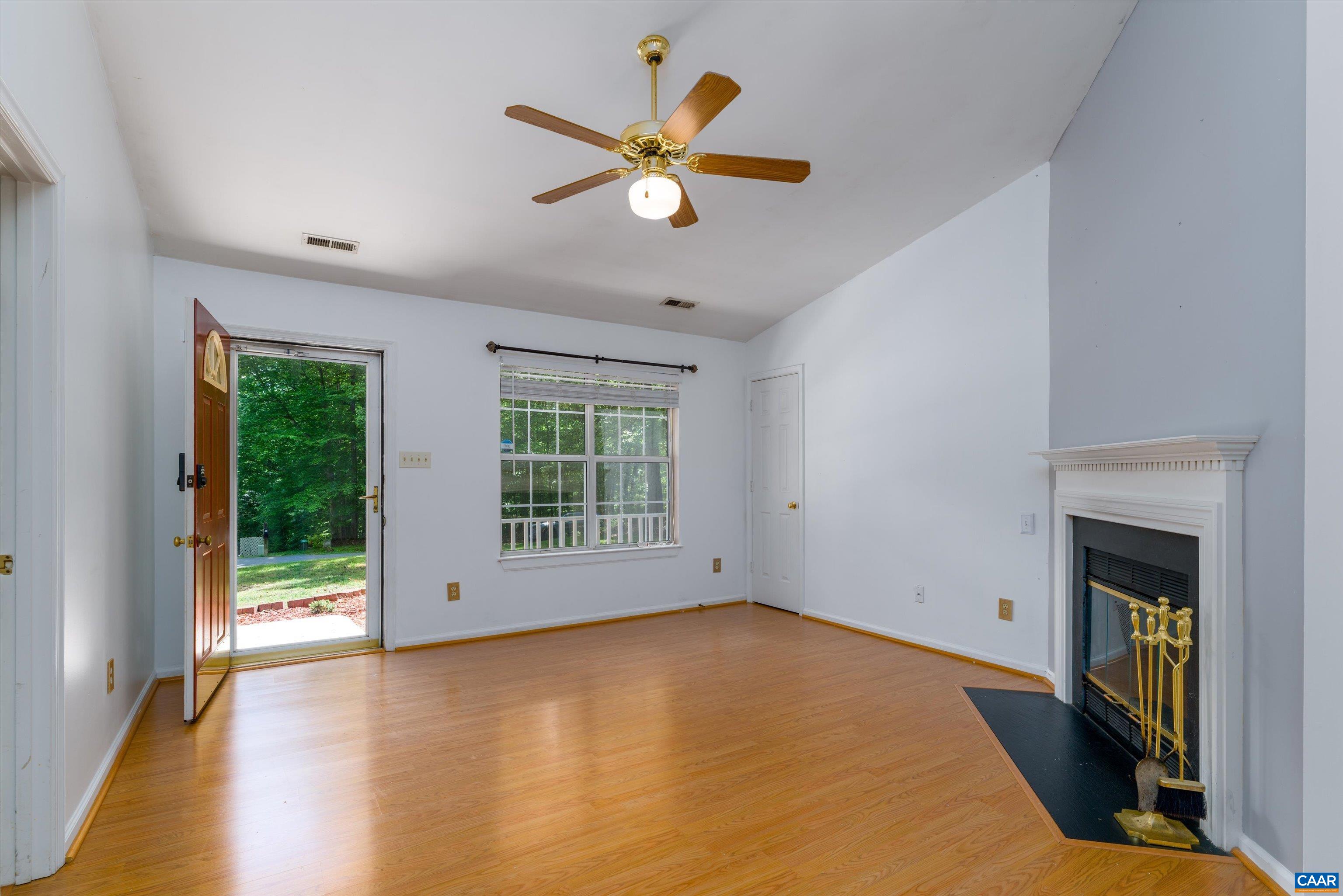 17 Riverside Drive Palmyra, VA 22963 - Photo 6 of 32 wooden floor in an empty room with a window