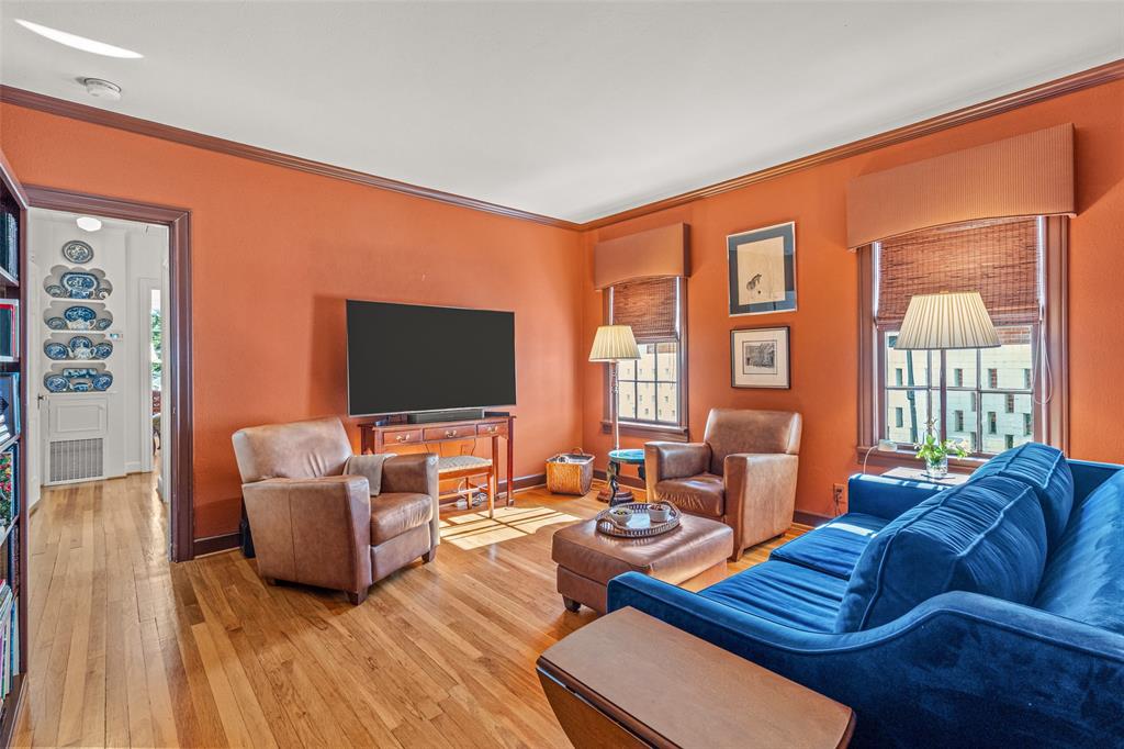 3628 Potomac Avenue Fort Worth, TX 76107 - Photo 12 of 32 a living room with furniture and a flat screen tv
