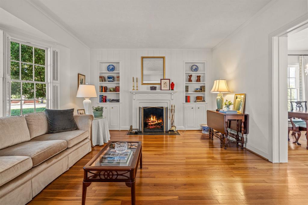 3628 Potomac Avenue Fort Worth, TX 76107 - Photo 6 of 32 a living room with furniture and a fireplace