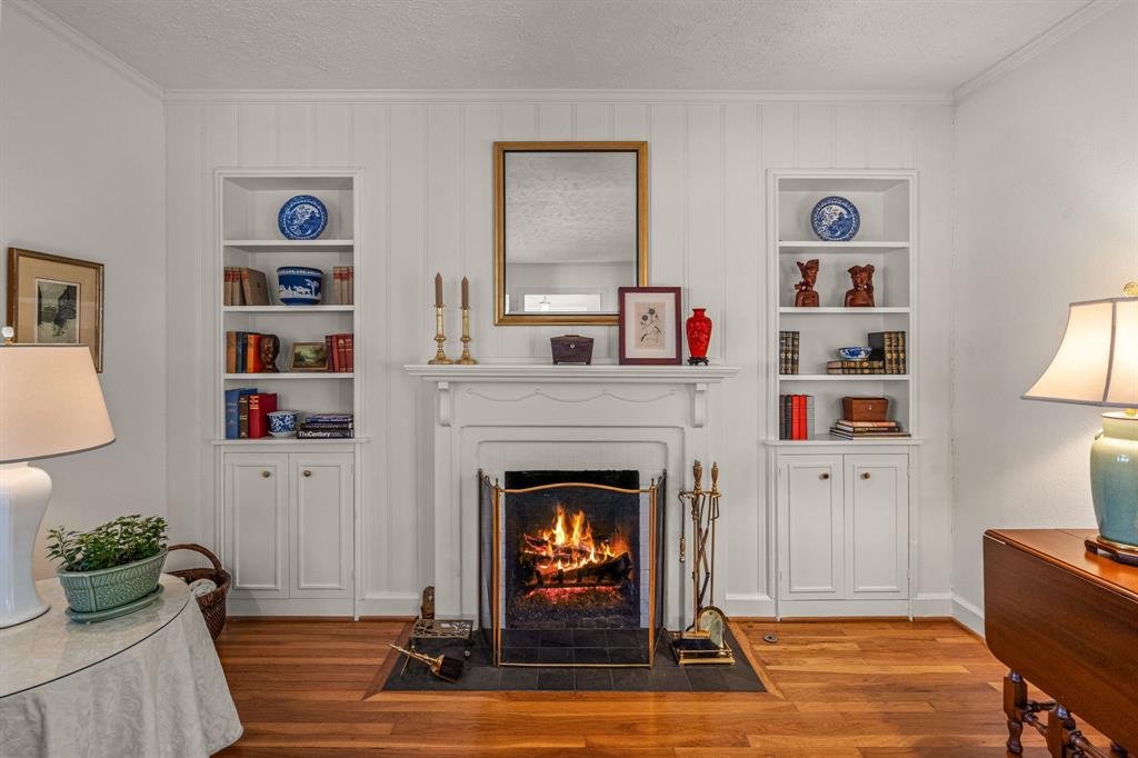 3628 Potomac Avenue Fort Worth, TX 76107 - Photo 7 of 32 a living room with furniture and a fireplace