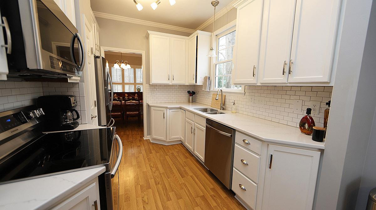 Kitchen w SS Appliances and Granite Counter Tops