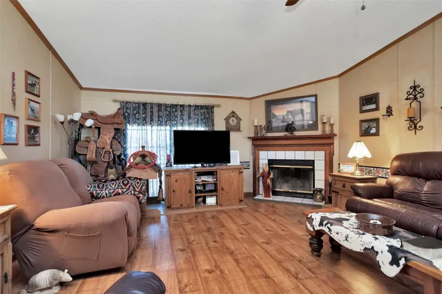 a view of a workspace with a window and couch