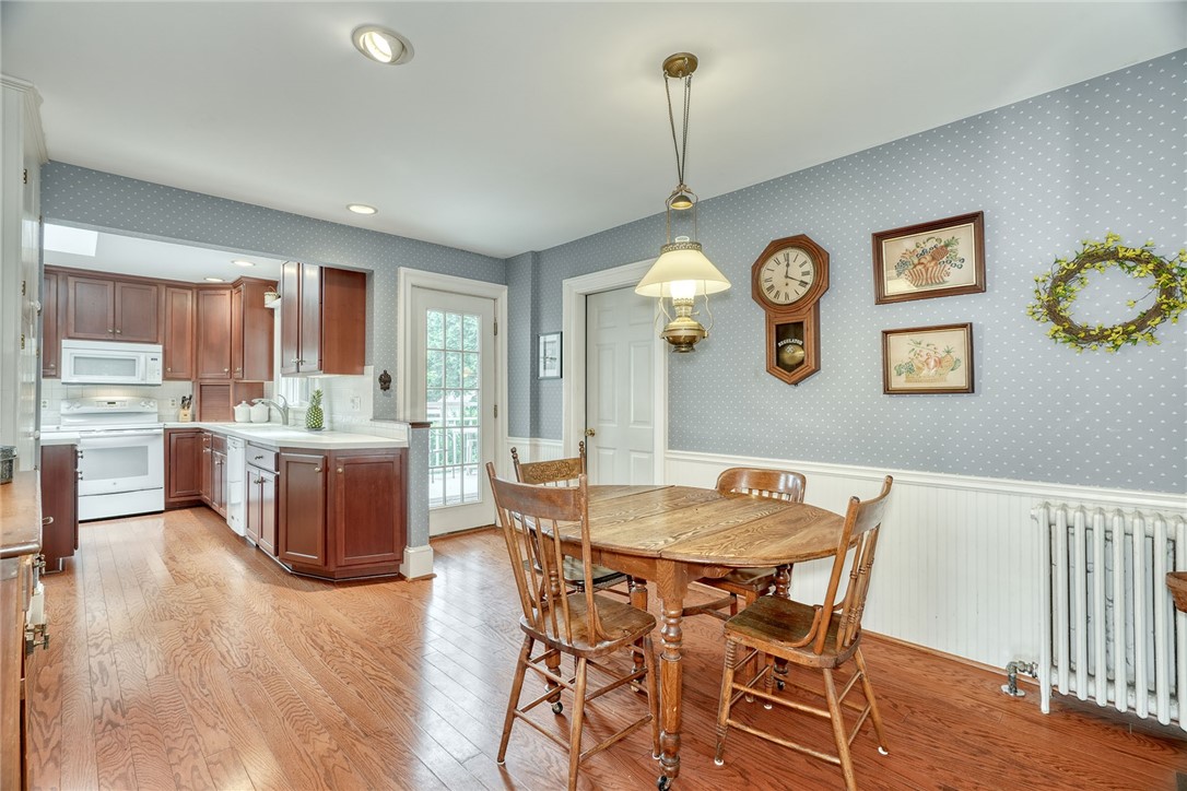 1479 Creek Street Rochester, NY 14625 - Photo 23 of 50 KITCHEN * DOORS TO BACKYARD DECK & GARAGE