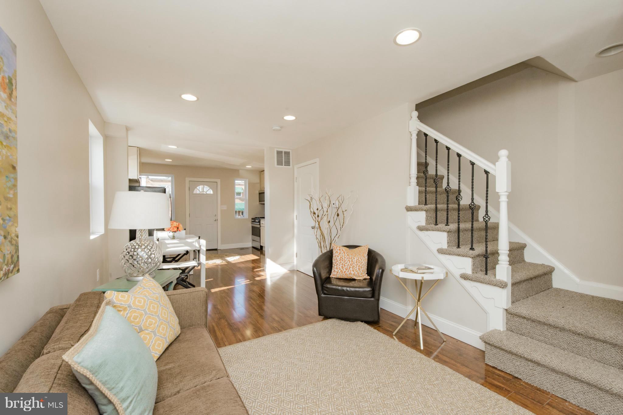 6922 Reisterstown Road Baltimore, MD 21215 - Photo 2 of 30 a living room with furniture