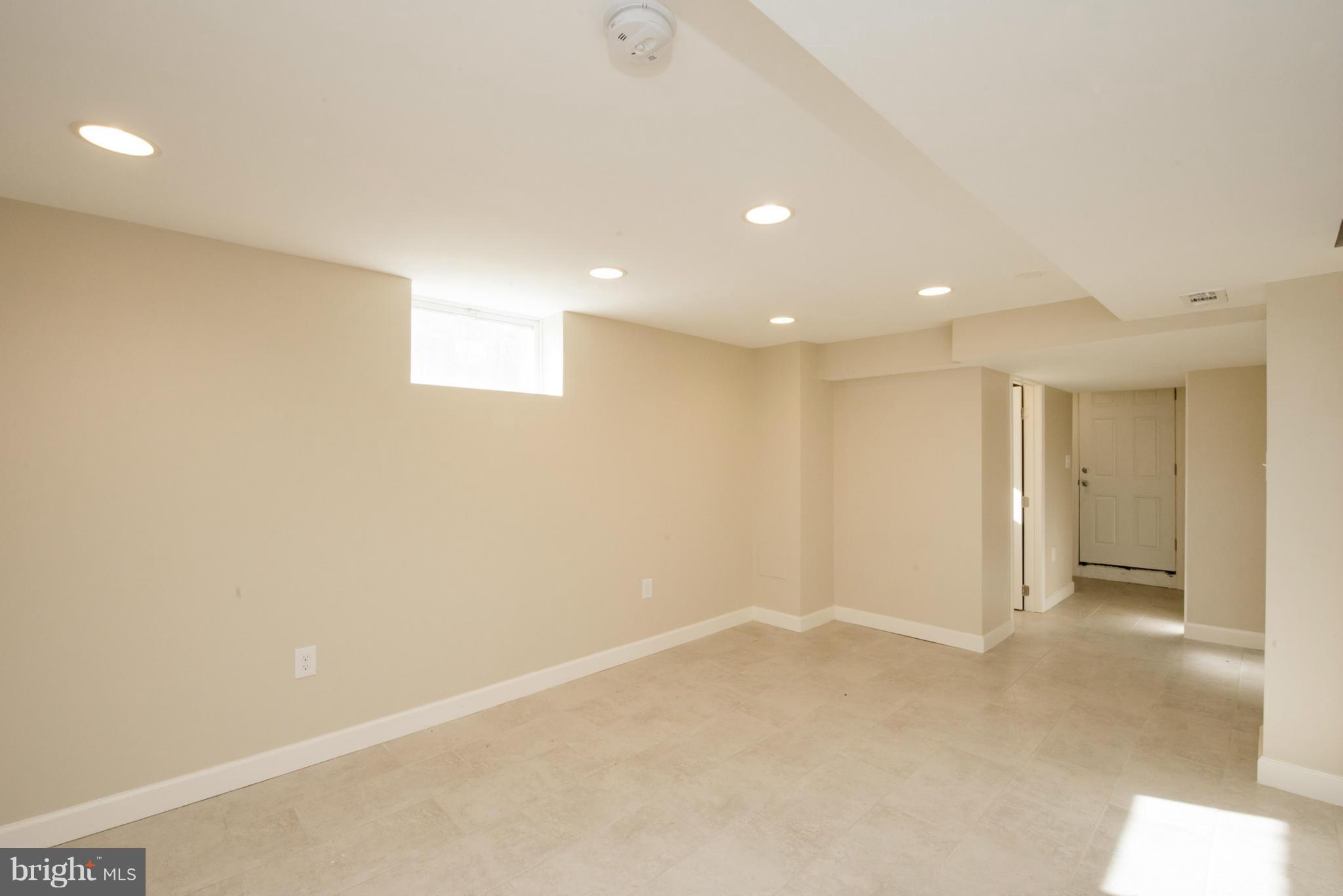 6922 Reisterstown Road Baltimore, MD 21215 - Photo 24 of 30 a view of an empty room