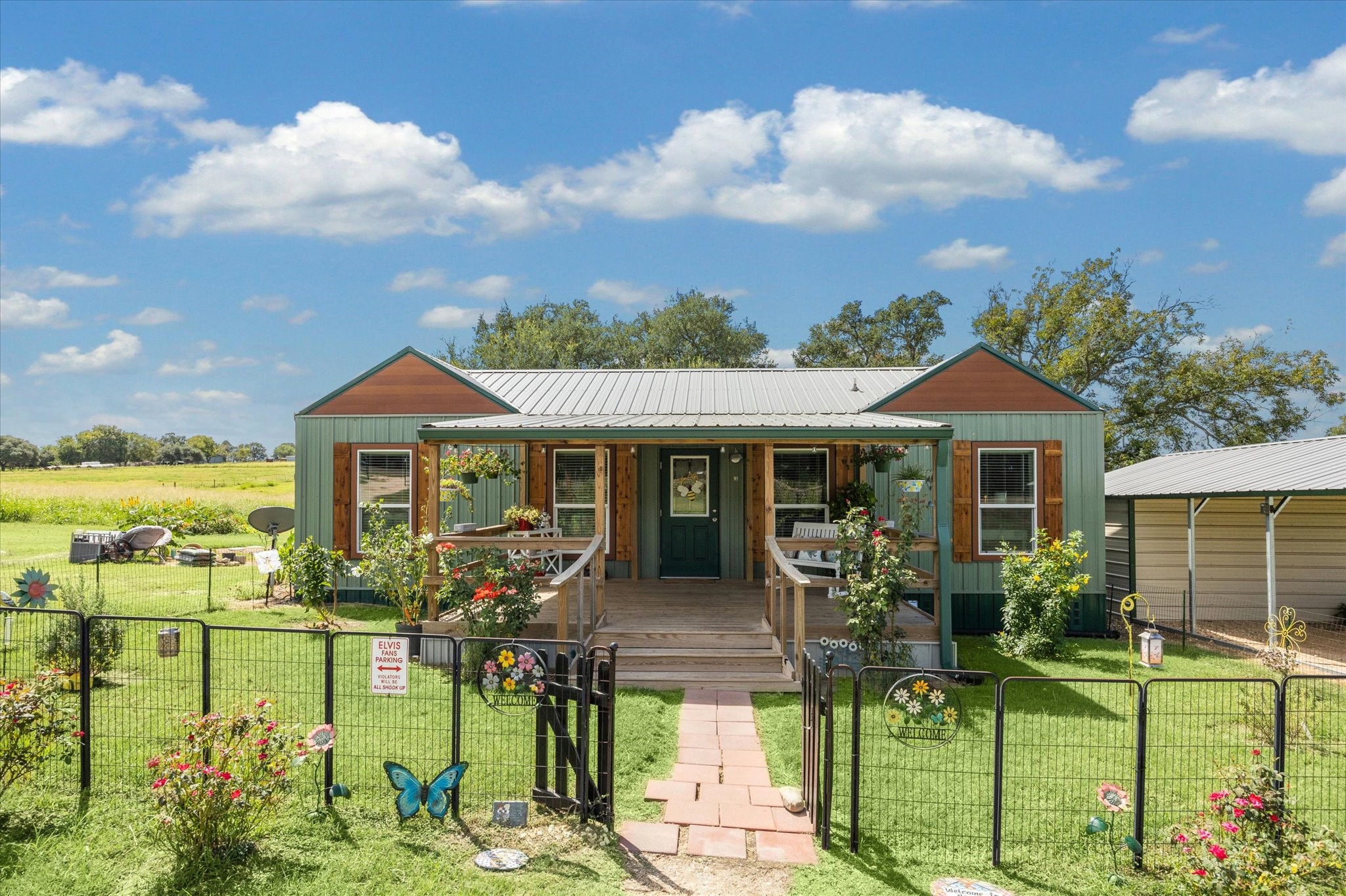 9015 Highway 36 Brenham, TX 77833 - Photo 3 of 19 a front view of a house with garden