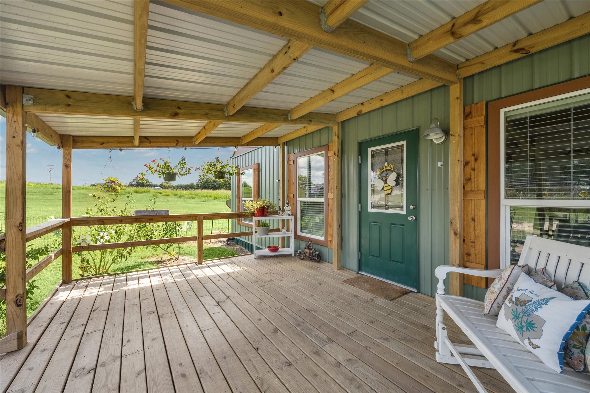 9015 Highway 36 Brenham, TX 77833 - Photo 5 of 19 a porch with wooden floor
