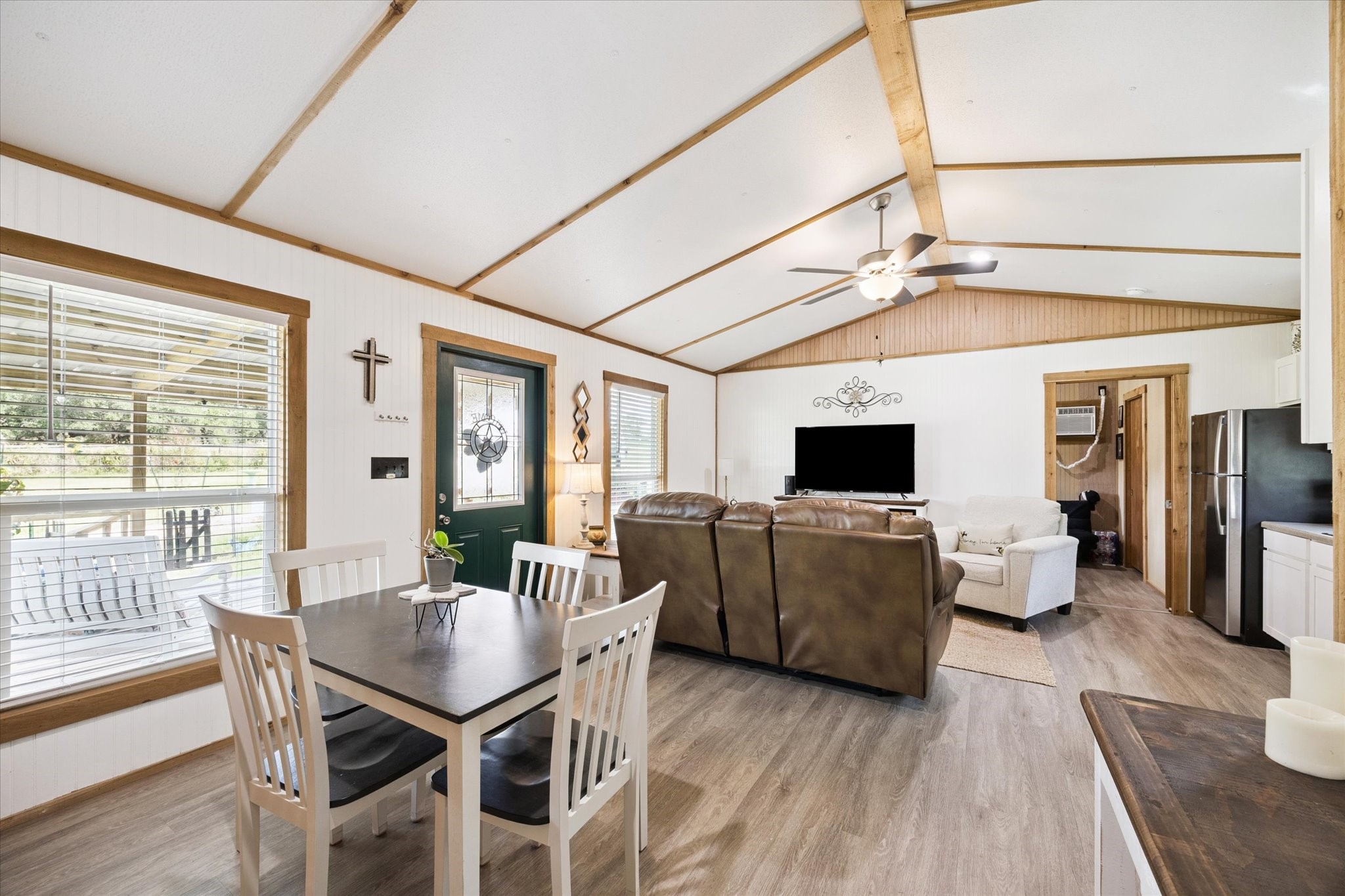 9015 Highway 36 Brenham, TX 77833 - Photo 8 of 19 a living room with furniture and a flat screen tv