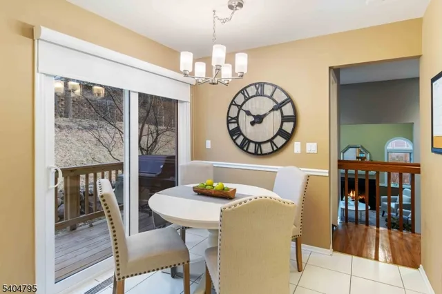 a bathroom with a double vanity sink a mirror and a bathtub