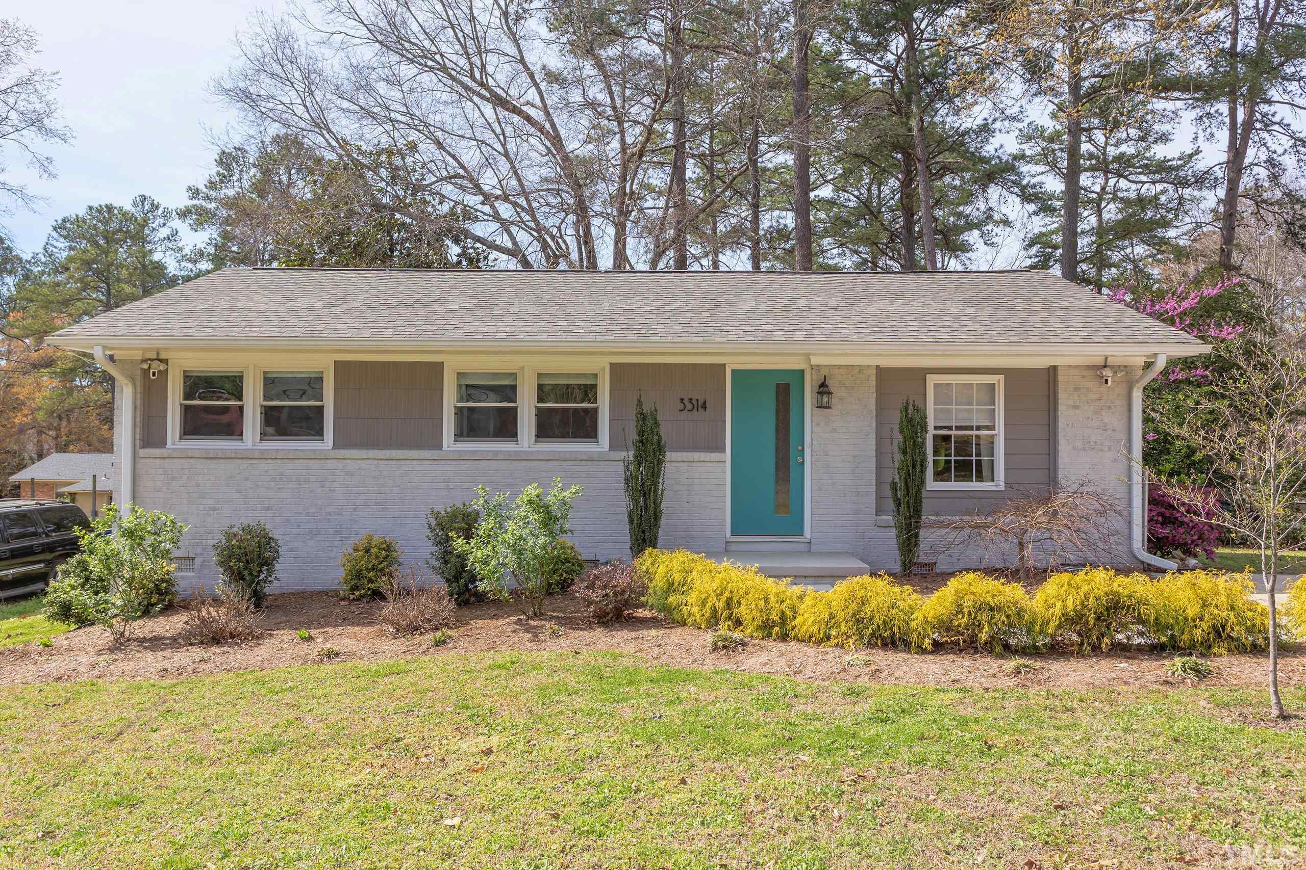 3314 Friar Tuck Road Raleigh, NC 27610 - Photo 1 of 42 a front view of a house with a yard