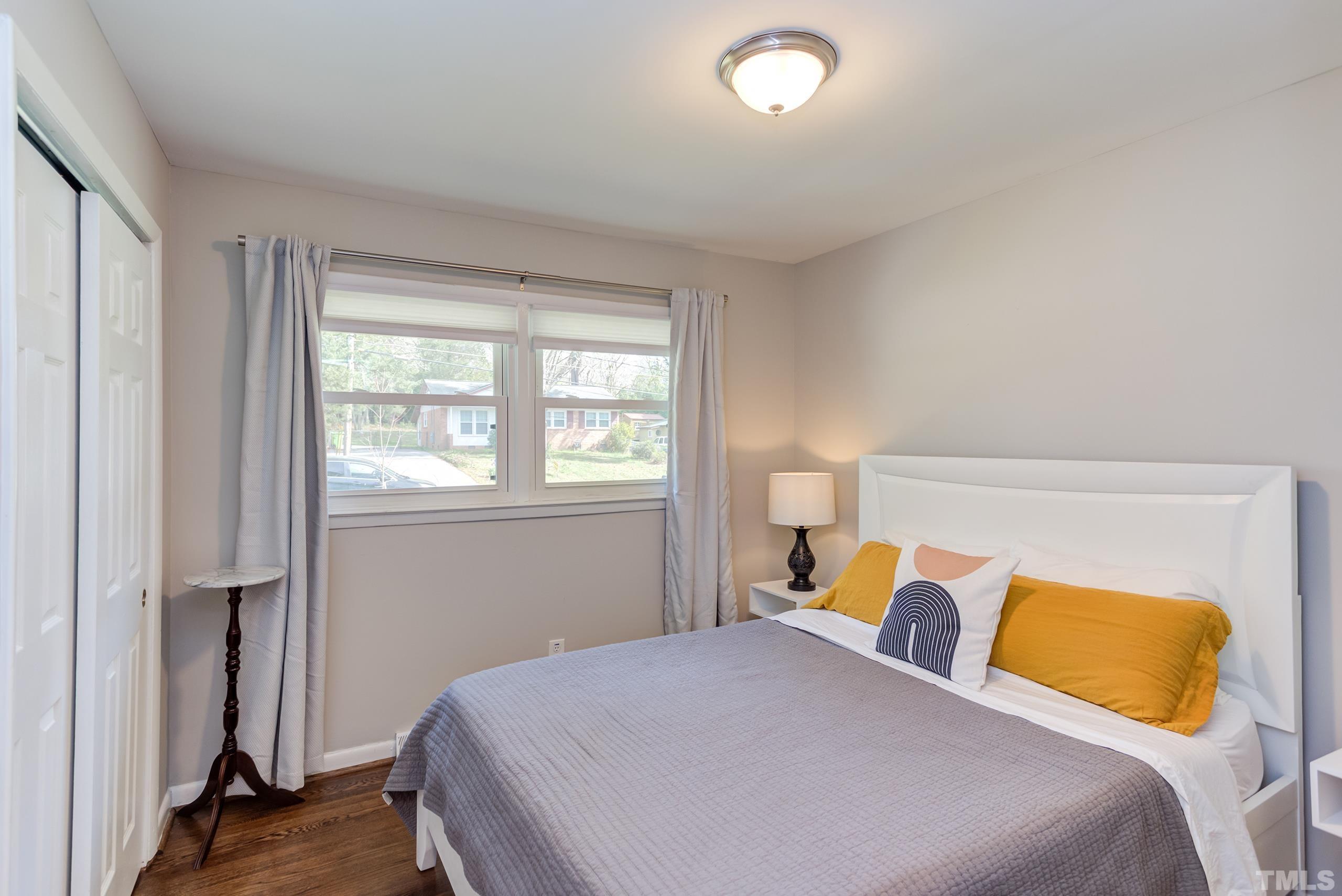 3314 Friar Tuck Road Raleigh, NC 27610 - Photo 21 of 42 a bedroom with a bed and window