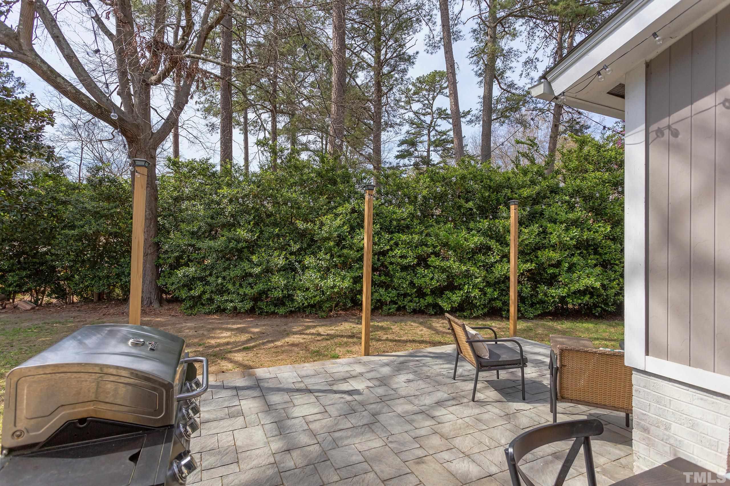 3314 Friar Tuck Road Raleigh, NC 27610 - Photo 30 of 42 a view of a bench in a backyard