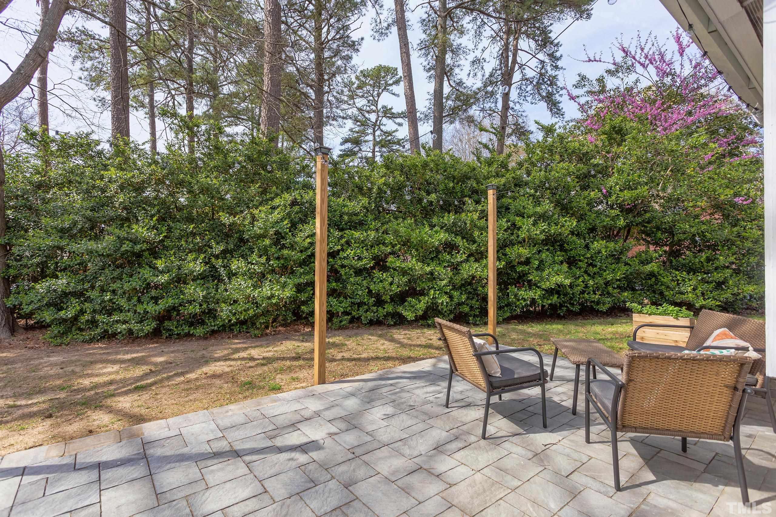 3314 Friar Tuck Road Raleigh, NC 27610 - Photo 31 of 42 a view of an chairs and tables in the patio