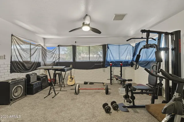a view of a room with gym equipment