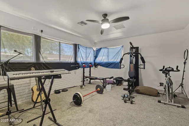 a view of a room with gym equipment