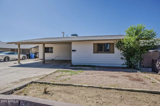 a view of a house with a patio