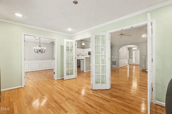 a view of a livingroom with wooden floor